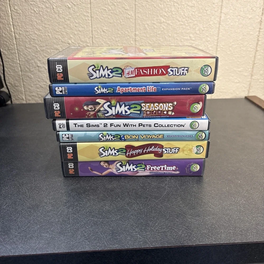 Lot of 7 The Sims 2 PC Game CD ROM Expansion Packs Manuals Complete In Box.